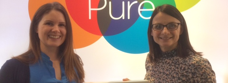 Pure presents lucky competition winner with Apple Watch