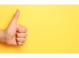 yellow background thumbs up